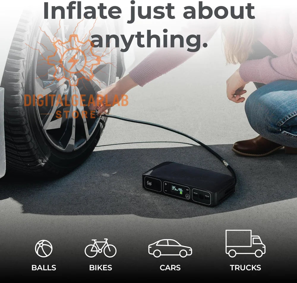 Black digital air compressor with a coiled hose and display screen showing pressure reading