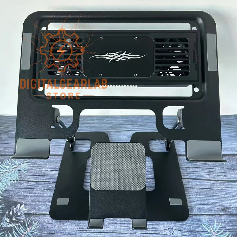 Black tribal design laptop stand with adjustable legs and non-slip surface.