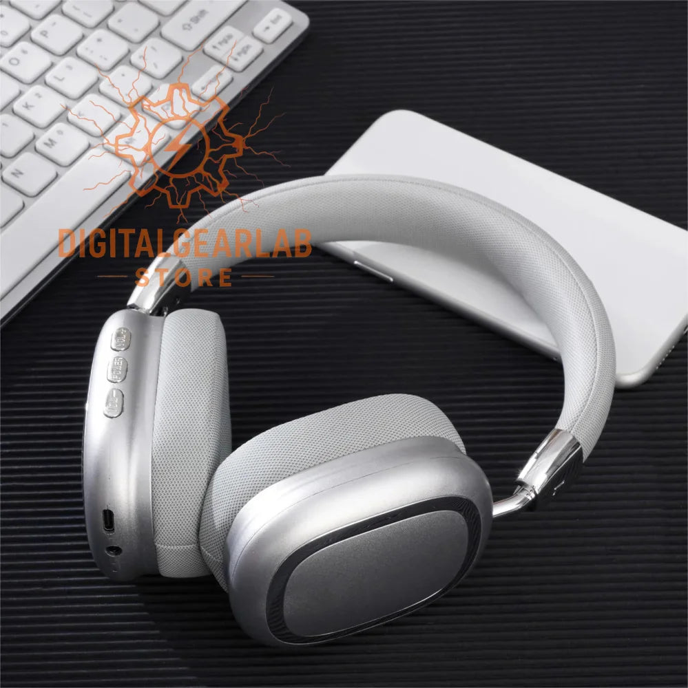 Silver over-ear headphones with fabric ear cups and metallic accents, likely from a popular brand known for audio equipment.